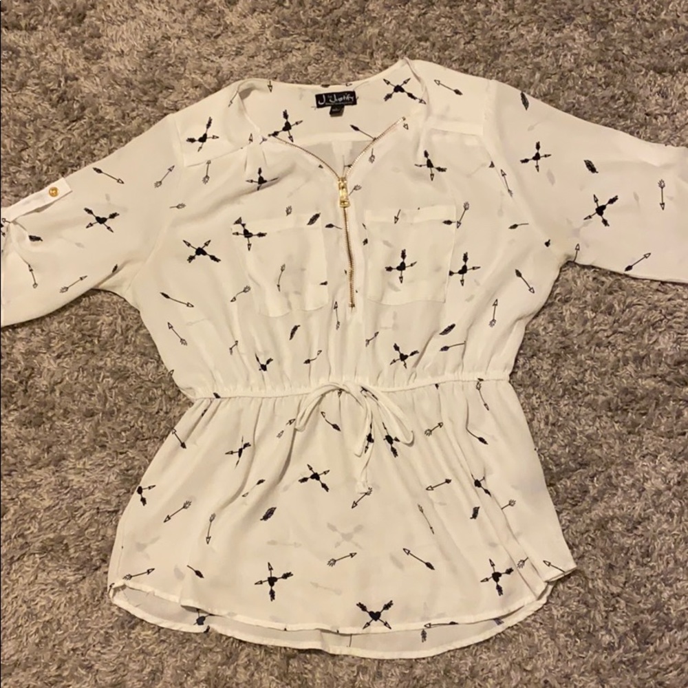 White blouse with hearts and arrows